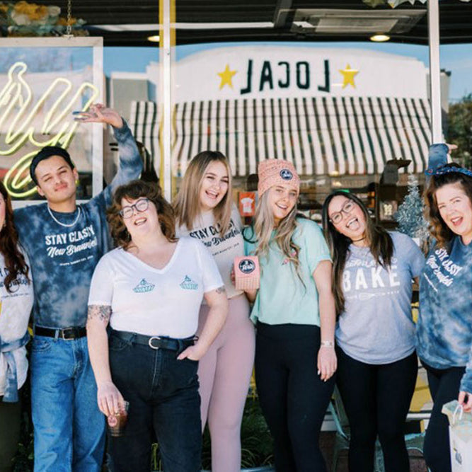 Photo of the 2tarts team standing outside of 2tarts Bakery in New Braunfels, Texas. 