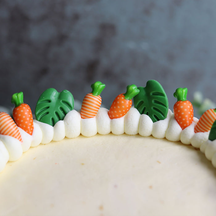 Tart Adorned with Whipped Cream and Chocolate Palm Leaf Decor