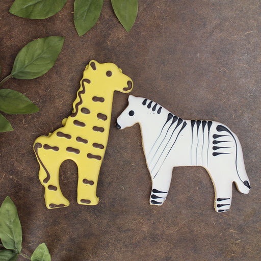 Decorated Cookies in shapes of zebras and giraffes