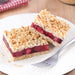 Triple berry crumble bars on plate