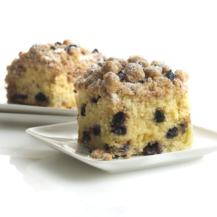 blueberry crumb cakes on plates
