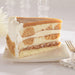 slice of salted caramel vanilla crunch cake