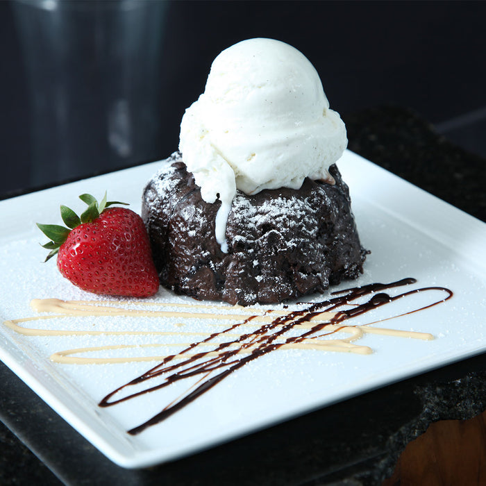 molten chocolate cake with ice cream and strawberry