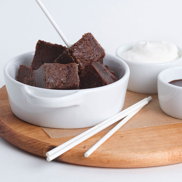 brownie bites in bowl with fondue sticks